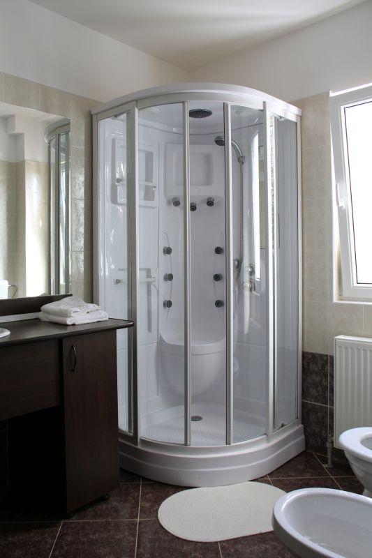Corner Shower with Curved Glass